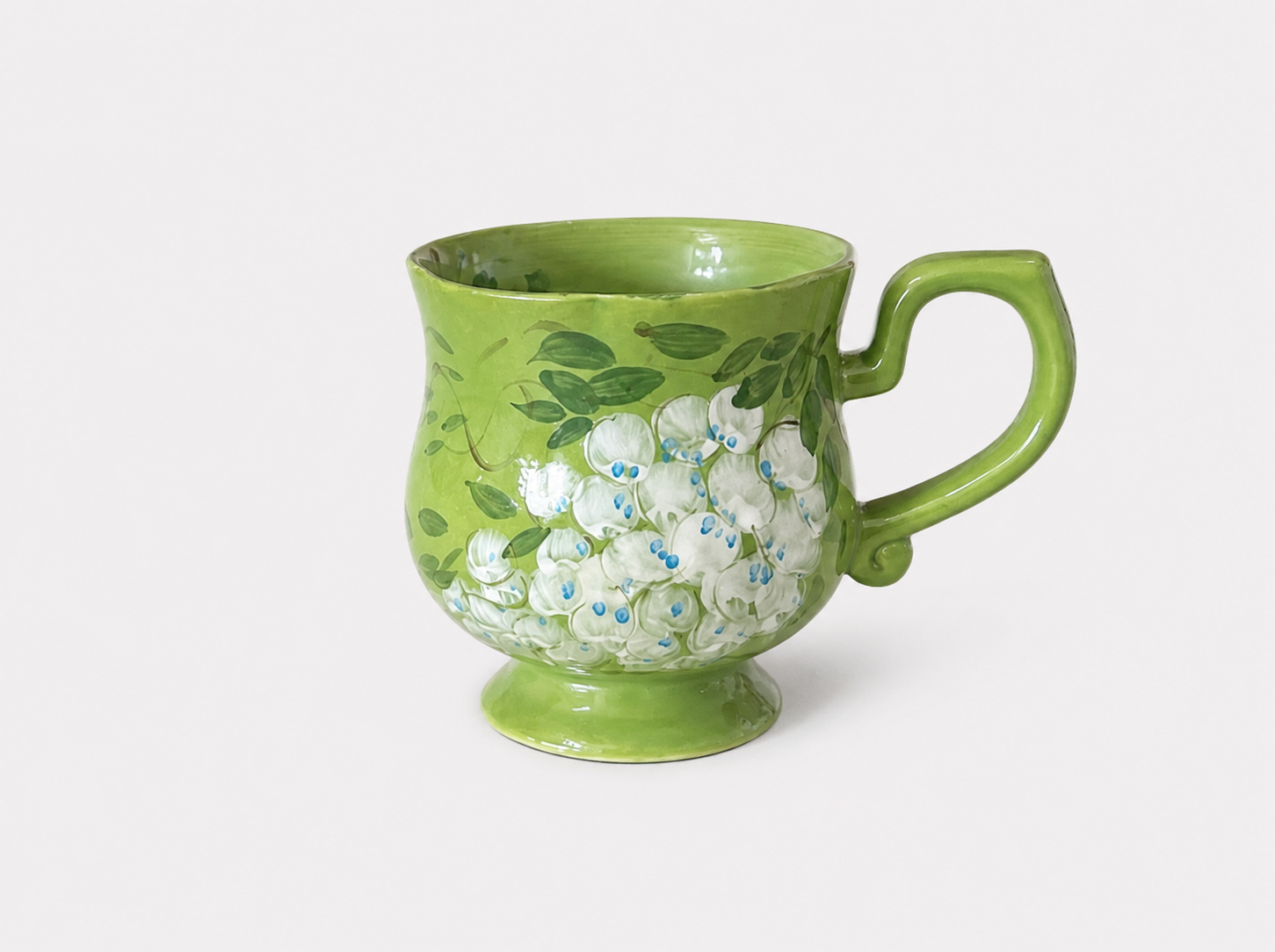 Hand-Painted Green Floral Ceramic Mug – Artisan Coffee Cup with Footed Base