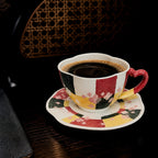 Handbemalte Keramiktasse mit Fliederdesign – Artisan Kaffeetasse mit Fuß